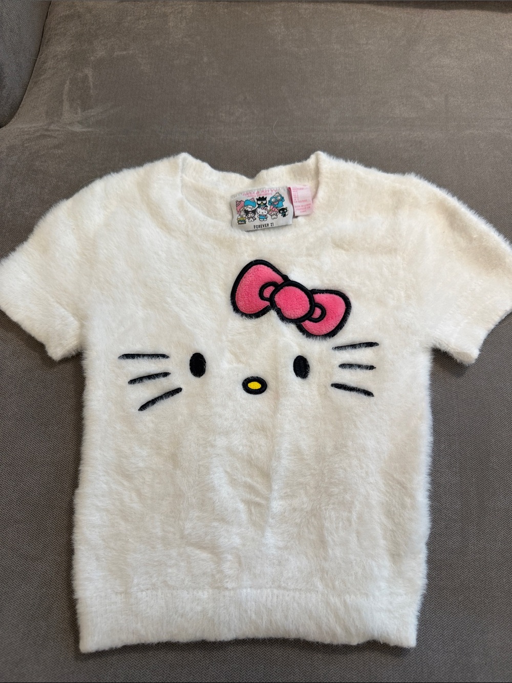 Hello Kitty White Fuzzy Short-Sleeve Top with Pink Bow Accent